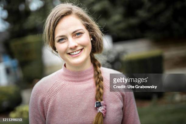 In this photo illustration a young woman smiles into the camera on April 28, 2020 in Radevormwald, Germany.