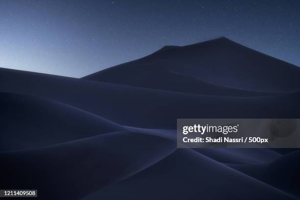 blue sands of liwa desert, abu dhabi, united arab emirates - abu dhabi night stock pictures, royalty-free photos & images