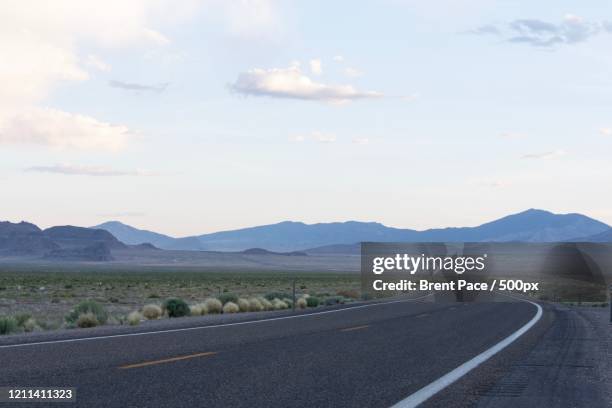 road leading to spring mountains, ely, nevada, usa - spring mountains stock pictures, royalty-free photos & images