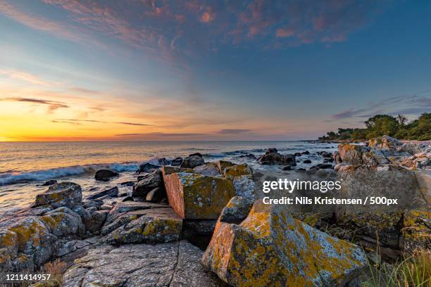 view of sunrise over sea - bornholm island stock pictures, royalty-free photos & images