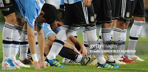 Argentine's players react at the end their FIFA World Cup U20 football match against Portugal at Jaime Moron Olimpic stadium in Cartagena, Colombia,...