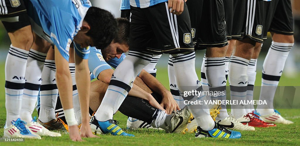 Argentine's players react at the end the