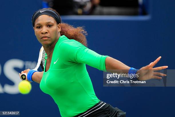 Serena Williams returns a shot to Samantha Stosur of Australia on Day 7 in the final of the Rogers Cup presented by National Bank at the Rexall...