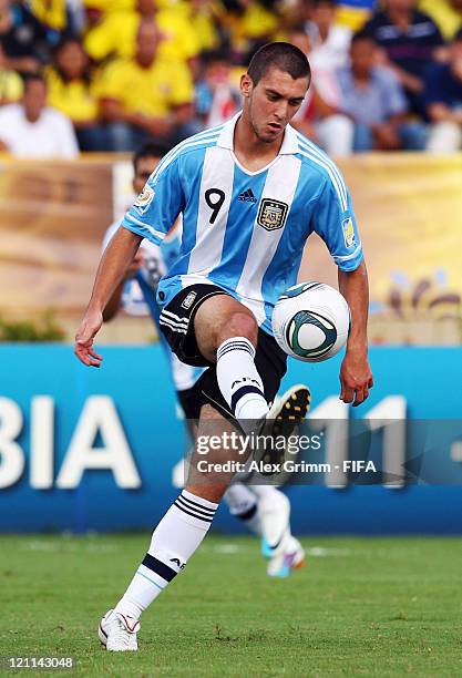 Facundo Ferreyra of Argentina controles the ball during the FIFA U-20 World Cup 2011 quarter final match between Portugal and Argentina at Estadia...