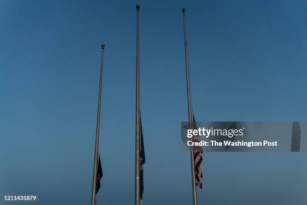 Flags are lowered to half-mast at the Southeast Louisiana Veterans Home in Reserve, Louisiana on April 26, 2020.