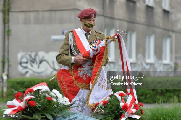 Major Jan Stachow , a former soldier and still active amateur athlete seen preparing a banner at Daszynski Avenue to celebrate May Day outside the...