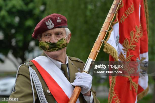 Major Jan Stachow , a former soldier and still active amateur athlete seen with a banner at Daszynski Avenue to celebrate May Day outside the...