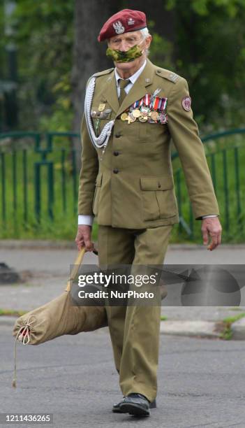 Major Jan Stachow , a former soldier and still active amateur athlete arrives at Daszynski Avenue to celebrate May Day outside the Monument to the...