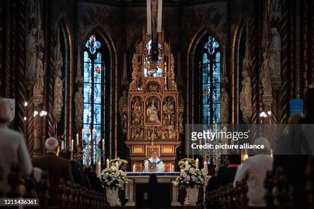 May 2020, North Rhine-Westphalia, Kevelaer: Georg Bätzing , Bishop of Limburg and Chairman of the German Bishops' Conference, preaches during the...