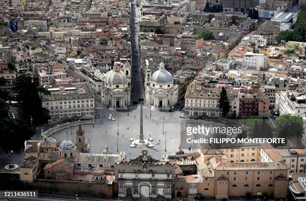 This aerial photograph taken on May 1, 2020 shows the empty Piazza del Popolo in Rome on May day during the country's lockdown aimed at curbing the...