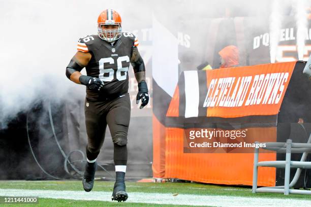 Offensive guard Shawn Lauvao of the Cleveland Browns runs onto the field during player introductions prior to a game against the Pittsburgh Steelers...