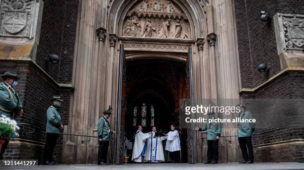 May 2020, North Rhine-Westphalia, Kevelaer: Georg Bätzing , Bishop of Limburg and Chairman of the German Bishops' Conference, stands at the church...