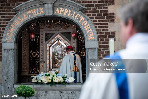 May 2020, North Rhine-Westphalia, Kevelaer: Georg Bätzing , Bishop of Limburg and President of the German Bishops' Conference, holds a prayer in the...