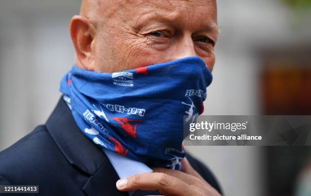 May 2020, Thuringia, Erfurt: Thomas Kemmerich , former Minister President of Thuringia, stands at a rally of employees from the cosmetics industry...