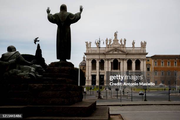General view of the Basilica di San Giovanni in Laterano area empty of tourists and without traffic on May day , during the Coronavirus pandemic, on...