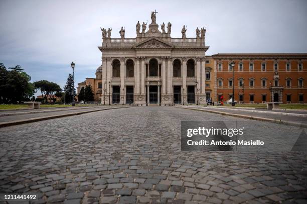 General view of the Basilica di San Giovanni in Laterano area empty of tourists and without traffic on May day , during the Coronavirus pandemic, on...