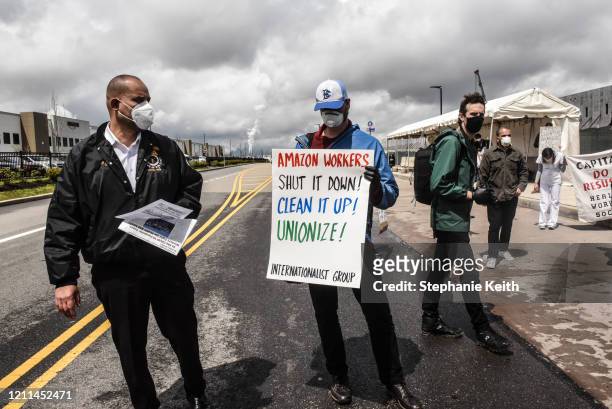 People protest working conditions outside of an Amazon warehouse fulfillment center on May 1, 2020 in the Staten Island borough of New York City....