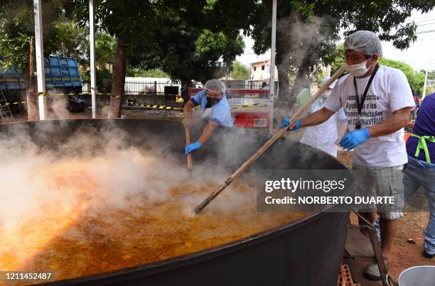 Volunteers prepare the country's biggest soup kitchen on May Day with the intention of feeding some 7000 vulnerable people during the COVID-19...