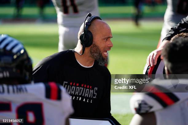Defensive line coach C.J. Ah You of the New York Guardians talks to his players during the XFL game against the Dallas Renegades at Globe Life Park...