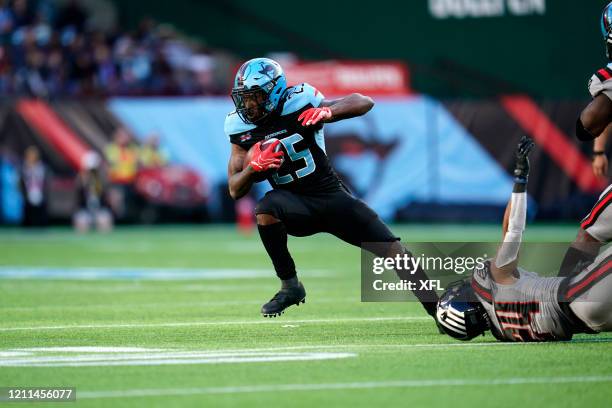 Lance Dunbar of the Dallas Renegades carries the ball during the XFL game against the New York Guardians at Globe Life Park on March 7, 2020 in...