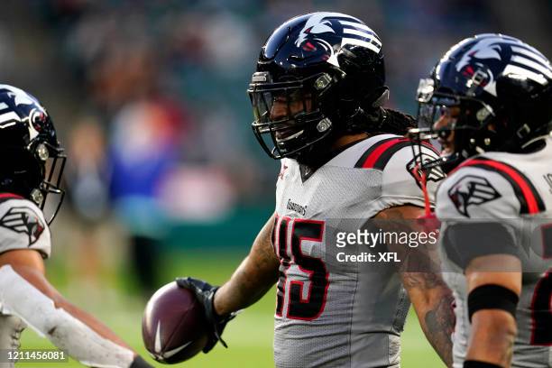 Juan Hines of the New York Guardians celebrates with his teammates during the XFL game against the Dallas Renegades at Globe Life Park on March 7,...