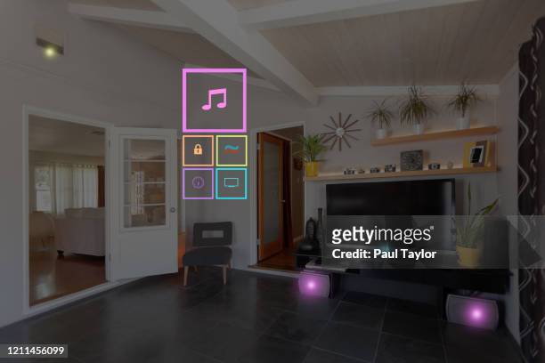family room interior with smart home control icons - home theatre stock pictures, royalty-free photos & images