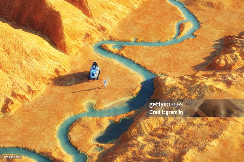 Astronaut on distant exo planet with water