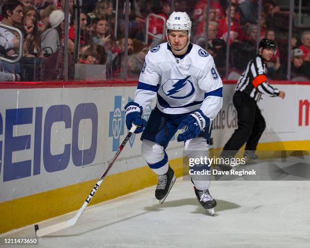 Mikhail Sergachev of the Tampa Bay Lightning controls the puck against the Detroit Red Wings during an NHL game at Little Caesars Arena on March 8,...