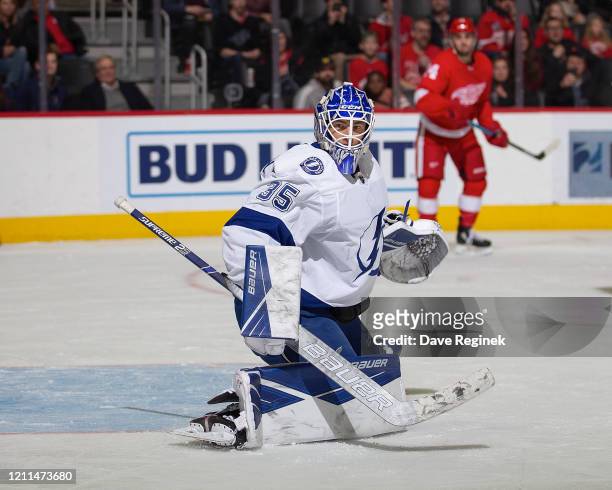 Curtis McElhinney of the Tampa Bay Lightning reacts to a shot against the Detroit Red Wings during an NHL game at Little Caesars Arena on March 8,...