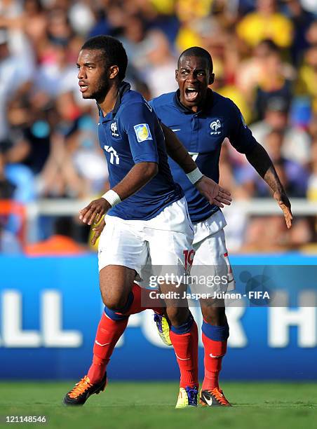 Alexandre Lacazette of France celebrates scoring his sides third goal with his teammate Gael Kakuta during the FIFA U-20 World Cup Colombia 2011...