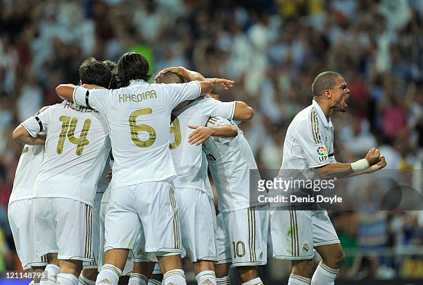 Pepe of Real Madrid celebrates Real's opening goal during the Super Cup first leg match between Real Madrid and Barcelona at Estadio Santiago...