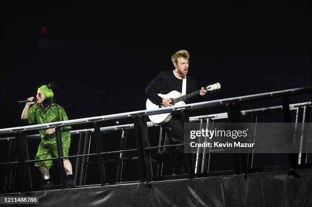 Billie Eilish and Finneas O'Connell perform live on stage at Billie Eilish "Where Do We Go?" World Tour Kick Off - Miami at American Airlines Arena...