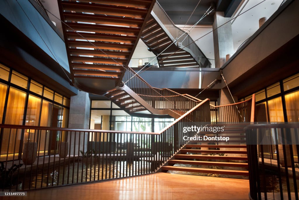 Curving staircase in modern home interior