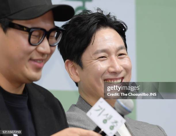 Han Jin-Won and Lee Sun-Kyun attend the press conference held for cast and crew of 'Parasite' on February 19, 2020 in Seoul, South Korea.