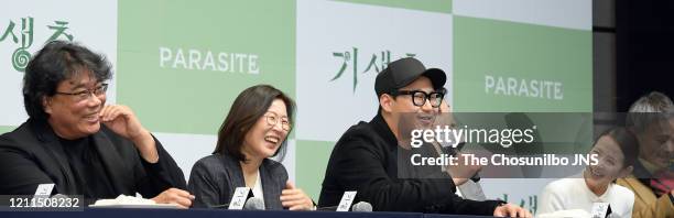 Bong Joon-Ho, Kwak Sin-Ae, and Han Jin-Won attend the press conference held for cast and crew of 'Parasite' on February 19, 2020 in Seoul, South...