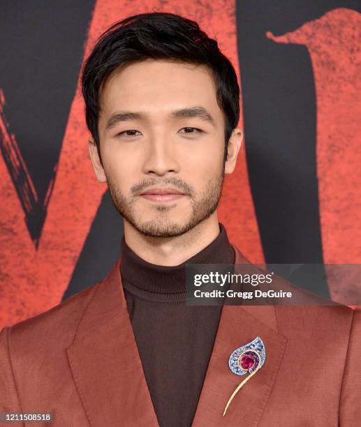 Yoson An attends the Premiere Of Disney's "Mulan" on March 09, 2020 in Hollywood, California.