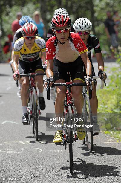 Janez Brajkovic of Slovenia riding for Team Radioshack leads the group for his teammate Levi Leipheimer of the USA in the overall race leaders jersey...