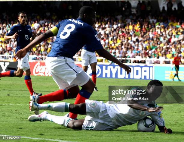 Edafe Egbedi, Nigeria, fights for the ball during the match between France and Nigeria by quarterfinals round of the FIFA U-20 World Cup 2011 at...