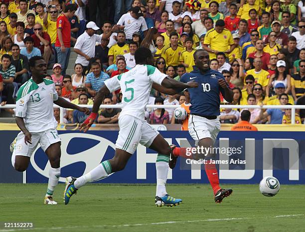 Gilles Sunu, from France, fights for the ball with Kenneth Omerou, Nigeria, DURING the match Between France and Nigeria by Quarterfinals round of the...