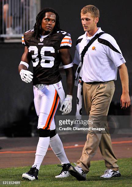 Cornerback Coye Francies of the Cleveland Browns walks to the locker room after being hurt on a play during a game with the Green Bay Packers at...