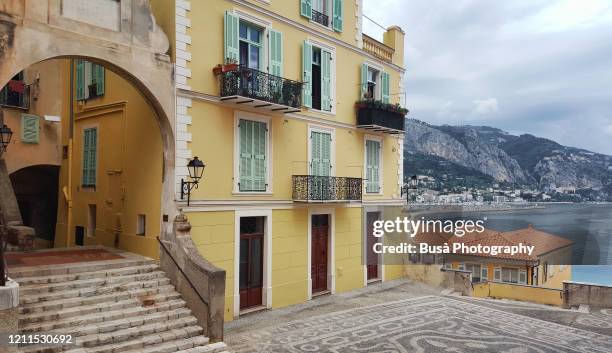 place de la conception in the historic center of menton, a coastal town in the alpes-maritimes department in the provence-alpes-côte d'azur along the french riviera, france - region provence alpes côte dazur stock-fotos und bilder