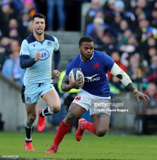Virimi Vakatawa of France breaks away from Adam Hastings during the 2020 Guinness Six Nations match between Scotland and France at Murrayfield on...