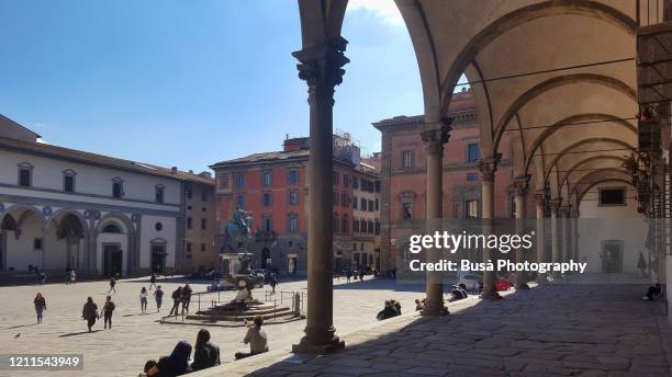 piazza della santissima annunziata, a famous monumental renaissance square in florence, italy - plaza stock-fotos und bilder