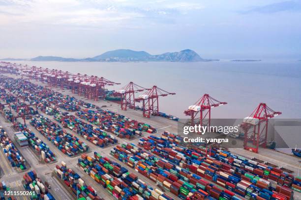 scene of cargo containers at yangshan port in china, asia - shanghai port stock pictures, royalty-free photos & images