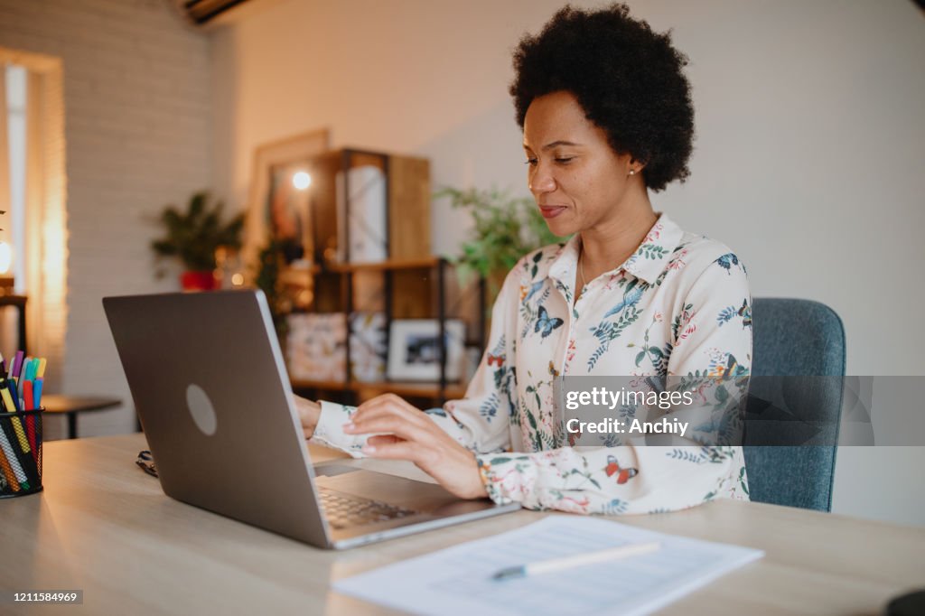 Woman working from home office