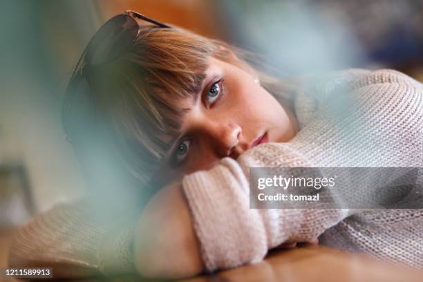 sad young woman - teenager staring imagens e fotografias de stock