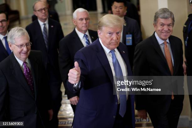 President Donald Trump, accompanied by Senate Majority Leader Mitch McConnell and Sen. Roy Blunt , arrives at the U.S. Capitol on March 10, 2020 in...
