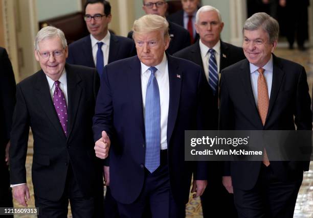 President Donald Trump, accompanied by Senate Majority Leader Mitch McConnell and Sen. Roy Blunt , arrives at the U.S. Capitol on March 10, 2020 in...