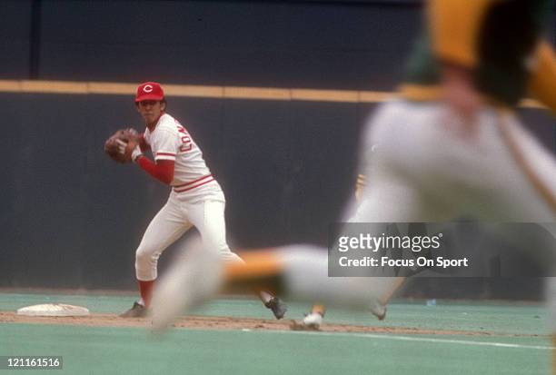 Dave Concepcion of the Cincinnati Reds turns the double play against the Oakland Athletics during the World Series in October 1972 at Riverfront...
