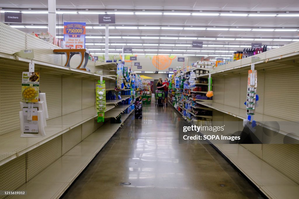 Toilet paper shelves are empty at a Save Mart supermarket...